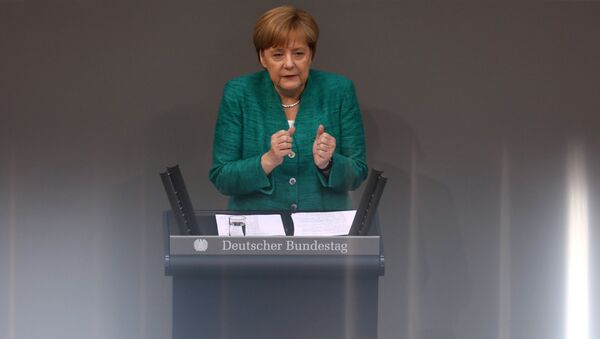 German Chancellor Angela Merkel addresses the German lower house of parliament Bundestag in Berlin, Germany, June 28, 2018 - Sputnik International