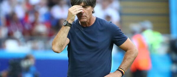 Soccer Football - World Cup - Group F - South Korea vs Germany - Kazan Arena, Kazan, Russia - June 27, 2018 Germany coach Joachim Low looks dejected during the match Soccer Football - World Cup - Group F - South Korea vs Germany - Kazan Arena, Kazan, Russia - June 27, 2018 Germany coach Joachim Low looks dejected during the match - Sputnik International