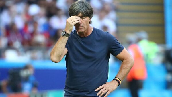 Soccer Football - World Cup - Group F - South Korea vs Germany - Kazan Arena, Kazan, Russia - June 27, 2018 Germany coach Joachim Low looks dejected during the match - Sputnik International
