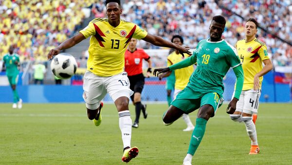 Soccer Football - World Cup - Group H - Senegal vs Colombia - Samara Arena, Samara, Russia - June 28, 2018 Colombia's Yerry Mina in action with Senegal's M'Baye Niang - Sputnik International