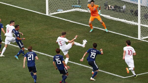 Soccer Football - World Cup - Group H - Japan vs Poland - Volgograd Arena, Volgograd, Russia - June 28, 2018 Poland's Jan Bednarek scores their first goal - Sputnik International