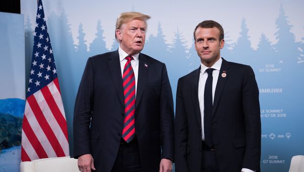 US President Donald Trump and French President Emmanuel Macron hold a meeting on the sidelines of the G7 Summit in La Malbaie, Quebec, Canada, June 8, 2018 - Sputnik International