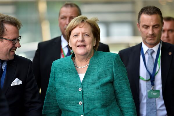 German Chancellor Angela Merkel arrives at a European People's Party (EPP) meeting ahead of a EU summit in Brussels, Belgium June 28, 2018 - Sputnik International