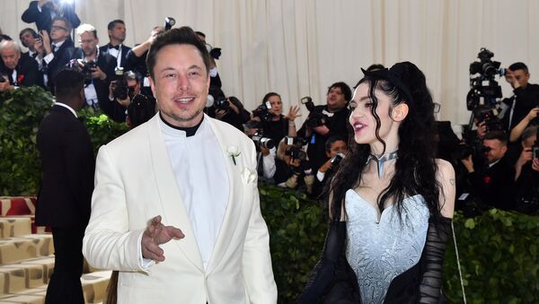 Elon Musk and Grimes arrive for the 2018 Met Gala on May 7, 2018, at the Metropolitan Museum of Art in New York - Sputnik International