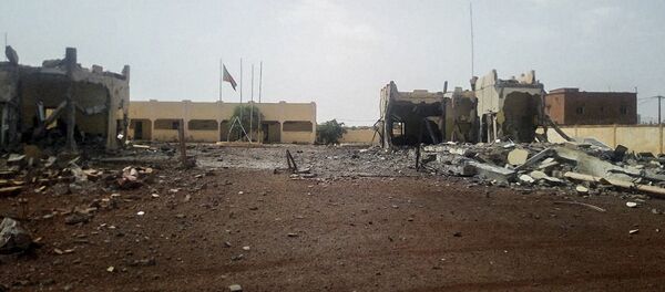 A picture taken in Sevare in central Mali, on June 29, 2018 shows debris scattered in front of the head quarter of the anti-terror task force, the G5 Sahel, after an attack of a suicide bomber who tried to penetrate the base - Sputnik International