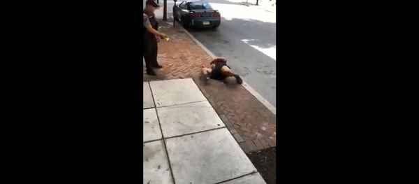 US police use Taser on seated, nonviolent suspect. US police use Taser on seated, nonviolent suspect. - Sputnik International