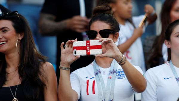 World Cup - Group G - England vs Belgium - Kaliningrad Stadium, Kaliningrad, Russia - June 28, 2018 Rebekah Vardy, wife of England's Jamie Vardy, takes a photo in the stands - Sputnik International