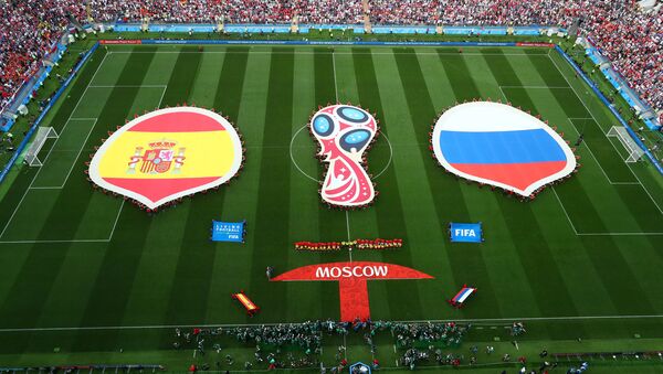 Soccer Football - World Cup - Round of 16 - Spain vs Russia - Luzhniki Stadium, Moscow, Russia - July 1, 2018 General view of both teams and officials lined up before the match - Sputnik International