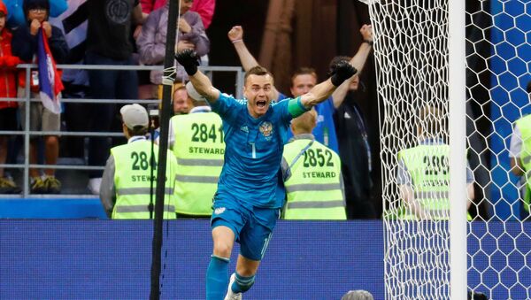 Soccer Football - World Cup - Round of 16 - Spain vs Russia - Luzhniki Stadium, Moscow, Russia - July 1, 2018 Russia's Igor Akinfeev celebrates winning the penalty shootout - Sputnik International