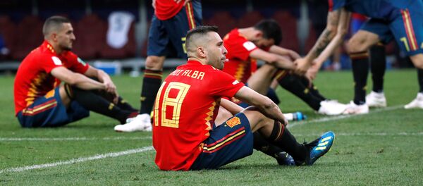 Soccer Football - World Cup - Round of 16 - Spain vs Russia - Luzhniki Stadium, Moscow, Russia - July 1, 2018 Spain's Jordi Alba and team mates look dejected after the match Soccer Football - World Cup - Round of 16 - Spain vs Russia - Luzhniki Stadium, Moscow, Russia - July 1, 2018 Spain's Jordi Alba and team mates look dejected after the match - Sputnik International