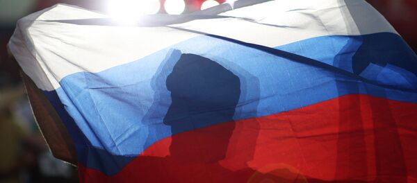 Fans celebrate the victory of the Russian team at the round of 16 match against Spain during the 2018 World Cup. - Sputnik International