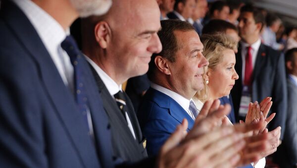 Russian Prime Minister Dmitry Medvedev and his wife Svetlana during the match of the World Cup 1/8 finals between Spain and Russia. - Sputnik International