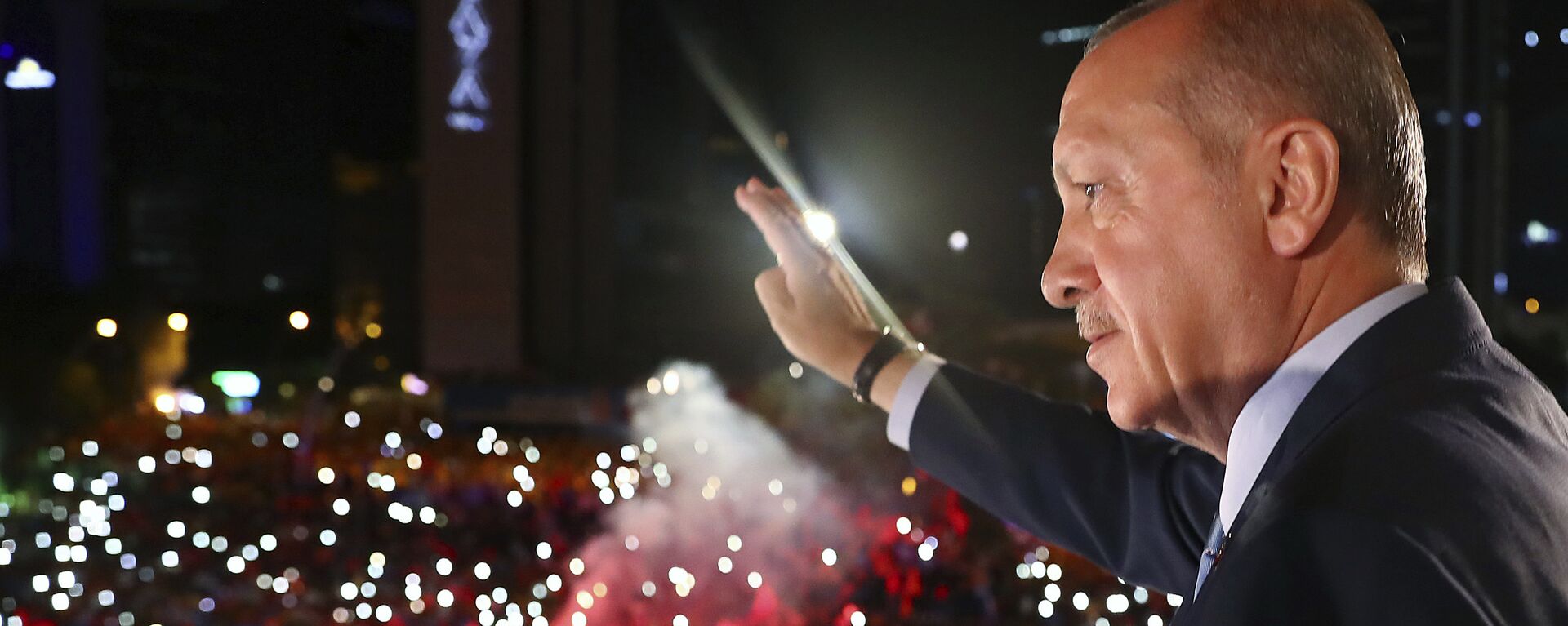 Turkey's President Recep Tayyip Erdogan, waves to supporters of his ruling Justice and Development Party (AKP) in Ankara, Turkey, early Monday, June 25, 2018. Erdogan won Turkey's landmark election Sunday, the country's electoral commission said, ushering in a new system granting the president sweeping new powers which critics say will cement what they call a one-man rule - Sputnik International, 1920, 17.02.2023