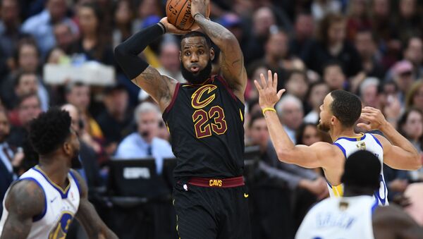 Jun 8, 2018; Cleveland, OH, USA; Cleveland Cavaliers forward LeBron James (23) tries to pass the ball against Golden State Warriors guard Stephen Curry (30) during the third quarter in game four of the 2018 NBA Finals at Quicken Loans Arena. Mandatory Credit: Ken Blaze-USA TODAY Sports - Sputnik International