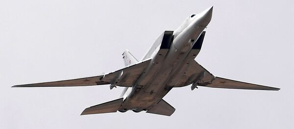 A Tupolev Tu-22M3 Backfire strategic bomber during a Victory Parade rehearsal at the Alabino training ground in the Moscow Region - Sputnik International