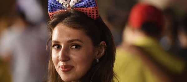 Russian fan celebrates victory in match against Spain in Moscow on July 1. Russian fan celebrates victory in match against Spain in Moscow on July 1. - Sputnik International