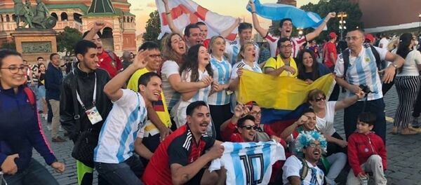 Football fans near the Saint Basil's Cathedral in the Red Square in Moscow Football fans near the Saint Basil's Cathedral in the Red Square in Moscow - Sputnik International