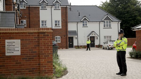 British police officers stand outside a residential property in Amesbury, England, Wednesday, July 4, 2018 - Sputnik International