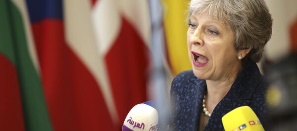 British Prime Minister Theresa May speaks with the media as she arrives for an EU summit at the Europa building in Brussels, Thursday, June 28, 2018. British Prime Minister Theresa May speaks with the media as she arrives for an EU summit at the Europa building in Brussels, Thursday, June 28, 2018. - Sputnik International