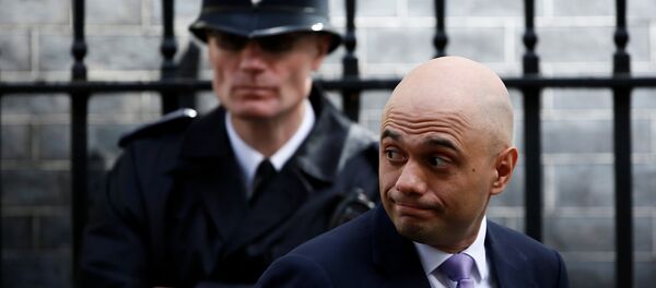 Der britische Innenminister Sajid Javid (Archivbild) Der britische Innenminister Sajid Javid (Archivbild) - Sputnik International