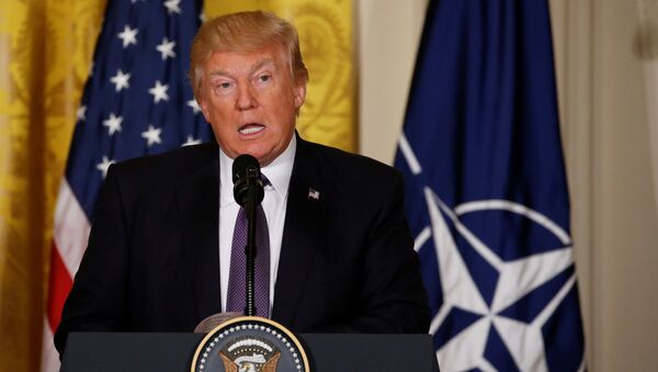 U.S. President Donald Trump addresses a joint news conference with NATO Secretary General Jens Stoltenberg in the East Room at the White House in Washington - Sputnik International