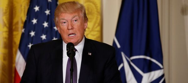 U.S. President Donald Trump addresses a joint news conference with NATO Secretary General Jens Stoltenberg in the East Room at the White House in Washington - Sputnik International