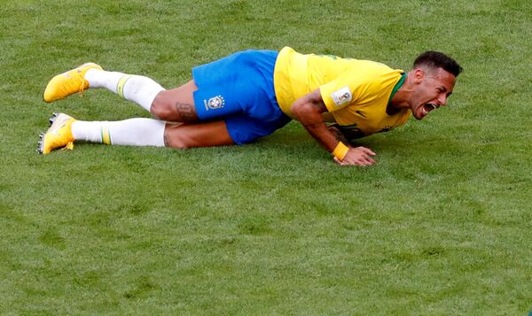 FILE PHOTO: World Cup - Round of 16 - Brazil vs Mexico - Samara Arena, Samara, Russia - July 2, 2018 Brazil's Neymar lies on the pitch after sustaining an injury  - Sputnik International