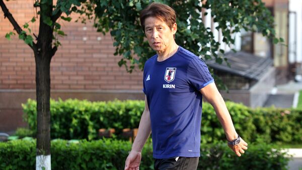 Soccer Football - World Cup - Japan Media Scrum - FC Rubin Kazan training base, Kazan, Russia - July 3, 2018 Japan's coach Akira Nishino arrives for media scrum - Sputnik International