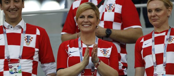President Kolinda Grabar-Kitarovic, center, applauds prior the round of 16 match between Croatia and Denmark at the 2018 soccer World Cup in the Nizhny Novgorod Stadium, in Nizhny Novgorod , Russia, Sunday, July 1, 2018 President Kolinda Grabar-Kitarovic, center, applauds prior the round of 16 match between Croatia and Denmark at the 2018 soccer World Cup in the Nizhny Novgorod Stadium, in Nizhny Novgorod , Russia, Sunday, July 1, 2018 - Sputnik International