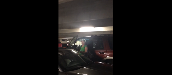 Georgia woman calls cops on black woman smoking in an outdoor parking garage Georgia woman calls cops on black woman smoking in an outdoor parking garage - Sputnik International