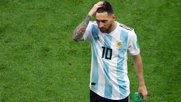 Soccer Football - World Cup - Round of 16 - France vs Argentina - Kazan Arena, Kazan, Russia - June 30, 2018 Argentina's Lionel Messi looks dejected at the end of the match - Sputnik International