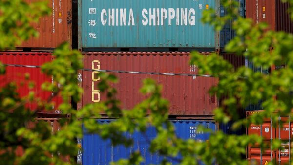 Shipping containers, including one labelled China Shipping, are stacked at the Paul W. Conley Container Terminal in Boston, Massachusetts, U.S., May 9, 2018 - Sputnik International
