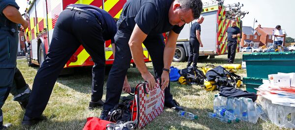 Fire and Rescue Service personel prepare safety equipment at the site of a housing estate on Muggleton Road, after it was confirmed that two people had been poisoned with the nerve-agent Novichok, in Amesbury, Britain, July 6, 2018. Fire and Rescue Service personel prepare safety equipment at the site of a housing estate on Muggleton Road, after it was confirmed that two people had been poisoned with the nerve-agent Novichok, in Amesbury, Britain, July 6, 2018. - Sputnik International