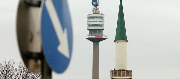A minaret of the Islamic Centre mosque is pictured next to the Donauturm tower in Vienna A minaret of the Islamic Centre mosque is pictured next to the Donauturm tower in Vienna - Sputnik International