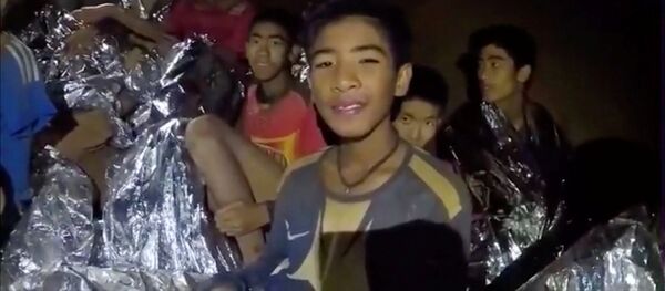 Boys from the under-16 soccer team trapped inside Tham Luang cave Boys from the under-16 soccer team trapped inside Tham Luang cave - Sputnik International
