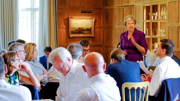 Britain's Prime Minister Theresa May commences a meeting with her cabinet to discuss the government's Brexit plans at Chequers, the Prime Minister's official country residence, near Aylesbury, Britain, July 6, 2018 - Sputnik International