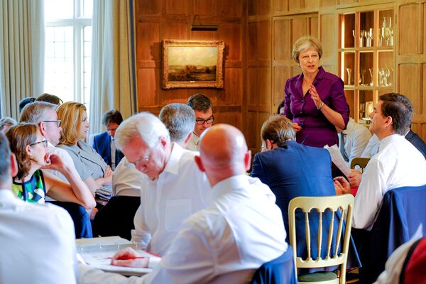 Britain's Prime Minister Theresa May commences a meeting with her cabinet to discuss the government's Brexit plans at Chequers, the Prime Minister's official country residence, near Aylesbury, Britain, July 6, 2018 Britain's Prime Minister Theresa May commences a meeting with her cabinet to discuss the government's Brexit plans at Chequers, the Prime Minister's official country residence, near Aylesbury, Britain, July 6, 2018 - Sputnik International