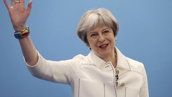 Britain's Prime Minister Theresa May, gestures during the Conservative Party's Spring Forum in central London, Saturday, March 17, 2018. - Sputnik International