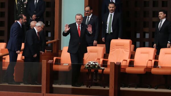 Turkish President Tayyip Erdogan greets deputies at the beginning of an oath-taking ceremony at the Turkish parliament in Ankara. - Sputnik International