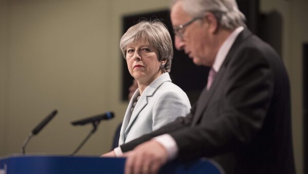 Prime Minister Theresa May meets with European Commission President Jean-Claude Juncker in Brussels (FILE photo). - Sputnik International