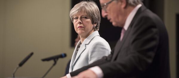 Prime Minister Theresa May meets with European Commission President Jean-Claude Juncker in Brussels (FILE photo). Prime Minister Theresa May meets with European Commission President Jean-Claude Juncker in Brussels (FILE photo). - Sputnik International