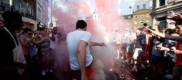 Soccer Football - World Cup - England fans watch Sweden vs England - London, Britain - July 7, 2018 England fans set off smoke bombs after the match Soccer Football - World Cup - England fans watch Sweden vs England - London, Britain - July 7, 2018 England fans set off smoke bombs after the match - Sputnik International