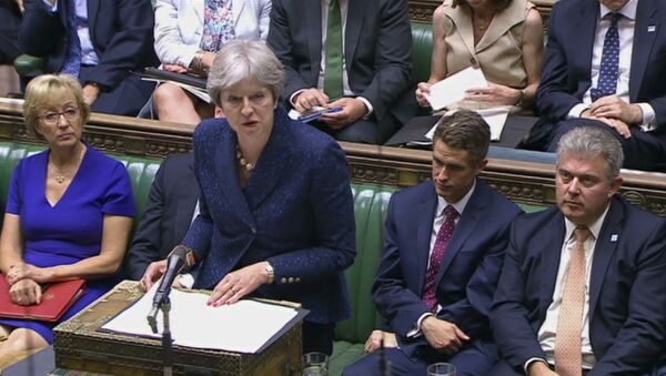In this image from TV, Britain's Prime Minister Theresa May gives a statement to parliament Monday July 9, 2018. - Sputnik International