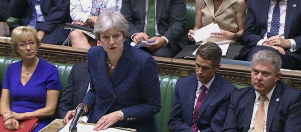 In this image from TV, Britain's Prime Minister Theresa May gives a statement to parliament Monday July 9, 2018. - Sputnik International