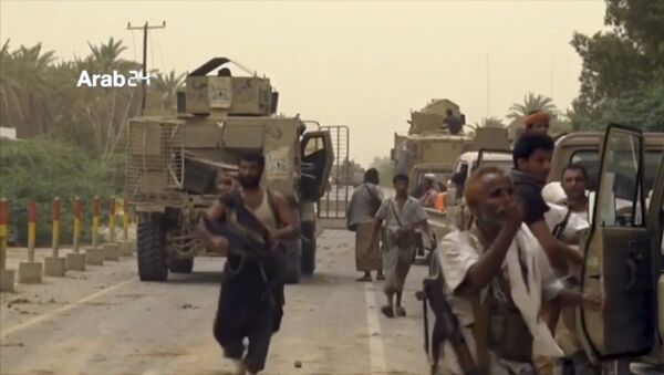 This Saturday, June 16, 2018 file still image taken from video provided by Arab 24 shows Saudi-led forces gathering to retake the international airport of Yemen's rebel-held port city of Hodeida from the Shiite Houthi rebels. - Sputnik International