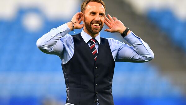 England manager Gareth Southgate salutes their fans after the match. - Sputnik International