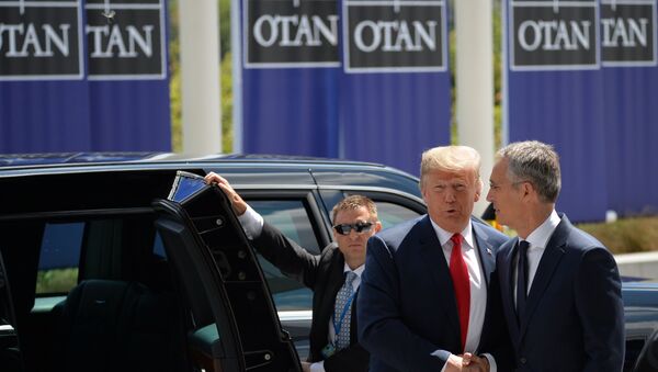 US President Donald Trump (L) and NATO Secretary General Jens Stoltenberg (R) are shaking hands at the meeting of NATO Heads of State and Government in Brussels, Belgium on 11 July 2018 - Sputnik International