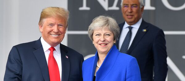 US President Donald Trump (L) gestures as he poses alongside Britain's Prime Minister Theresa May (R) as Portugal's Prime Minister Antonio Costa (TOP) looks on during the opening ceremony of the NATO (North Atlantic Treaty Organization) summit, at the NATO headquarters in Brussels, on July 11, 2018. US President Donald Trump (L) gestures as he poses alongside Britain's Prime Minister Theresa May (R) as Portugal's Prime Minister Antonio Costa (TOP) looks on during the opening ceremony of the NATO (North Atlantic Treaty Organization) summit, at the NATO headquarters in Brussels, on July 11, 2018. - Sputnik International