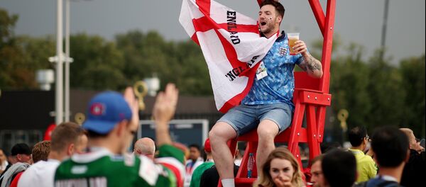 England's fan cheers waiting for the World Cup semifinal soccer match between Croatia and England, outside the Luzhniki stadium, in Moscow, Russia, July 11, 2018. England's fan cheers waiting for the World Cup semifinal soccer match between Croatia and England, outside the Luzhniki stadium, in Moscow, Russia, July 11, 2018. - Sputnik International