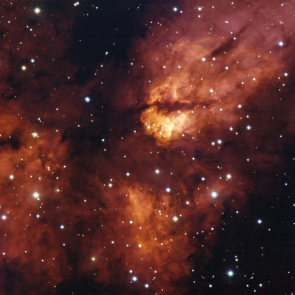 The dense star cluster RCW 38 glistens about 5,500 light years away in the direction of the constellation Vela (the Sails). RCW 38 is an embedded cluster, in that the nascent cloud of dust and gas still envelops its stars. - Sputnik International